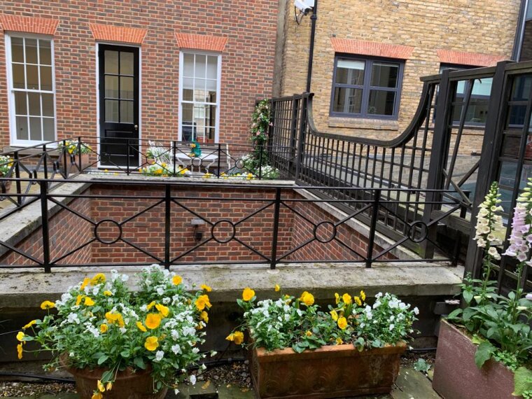 Planters around an outside first-floor terrace